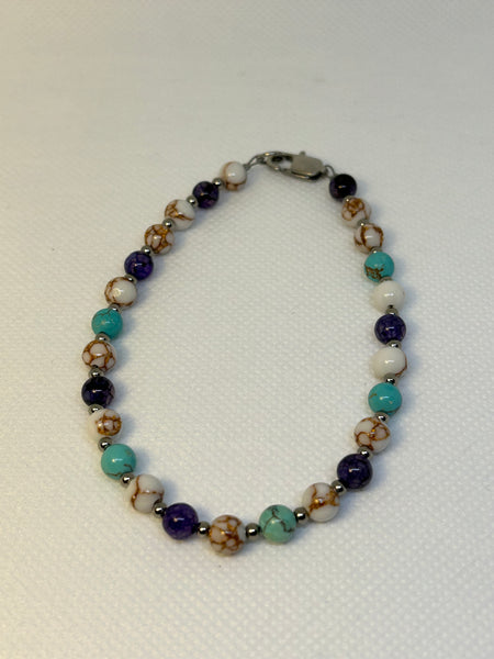 Handcrafted Howlite, purple vein agate, and turquoise ankle bracelet. Hypoallergenic stainless steel beads and clasp.EP145 FREE SHIPPING IN THE CONTINENTAL USA.
