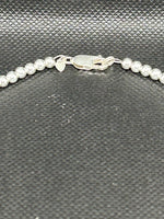 Handcrafted sterling silver necklace with 5  stones in Light Sugulite.  18”. SR1125 FREE SHIPPING IN THE CONTINENTAL USA.