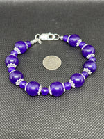 Handcrafted Purple Jade bracelet with filigree sterling silver bead enhancers. 7.5”. SR1126 FREE SHIPPING IN THE CONTINENTAL USA.