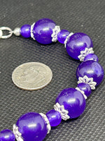 Handcrafted Purple Jade bracelet with filigree sterling silver bead enhancers. 7.5”. SR1126 FREE SHIPPING IN THE CONTINENTAL USA.