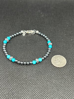 Handcrafted sterling silver and turquoise bracelet with fully oxidized silver beads.  7”.  SR1131 FREE SHIPPING IN THE CONTINENTAL USA.