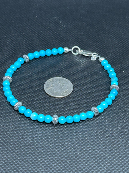 Handcrafted sterling silver and turquoise stone bracelet.  SR1133 FREE SHIPPING IN THE CONTINENTAL USA.