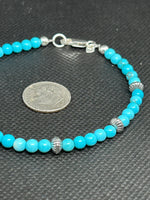 Handcrafted sterling silver and turquoise stone bracelet.  SR1133 FREE SHIPPING IN THE CONTINENTAL USA.