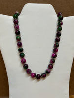 Genuine Ruby Zoisite stones with stainless steel beads and clasp.  18” length, 12mm stones. FREE SHIPPING IN THE CONTINENTAL USA.  EP177