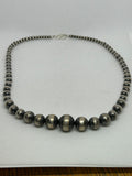 Navajo style pearl beads in sterling silver, 22”. 4mm to 16mm. 22” long.  SR2062   Ships Free in Con't USA