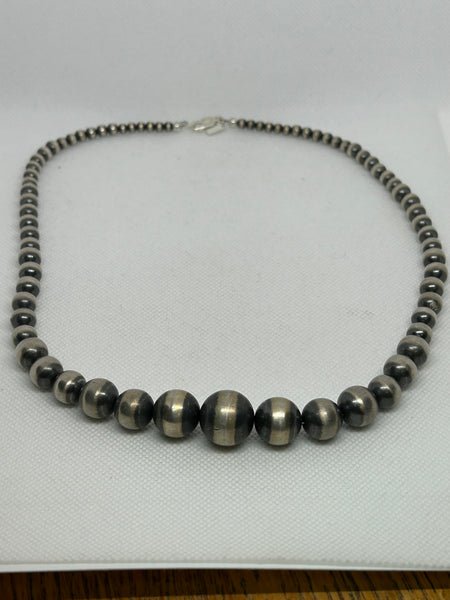 Navajo style pearl beads in sterling silver, 22”. 4mm to 16mm. 22” long.  SR2062   Ships Free in Con't USA