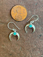 Sterling silver and genuine turquoise wire earrings. PS21
