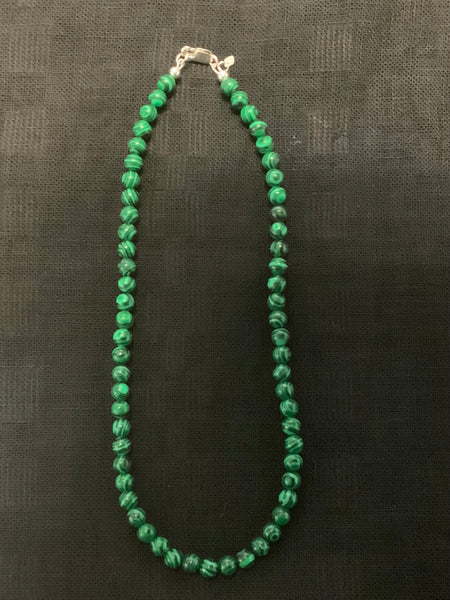 Malachite (lab) 6mm stones in a 15.5” necklace.  SR1065 FREE SHIPPING IN THE CONTINENTAL USA.