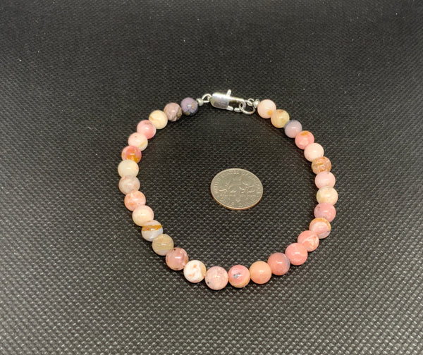 Genuine Rhodochrosite ankle bracelet with hypoallergenic stainless steel clasp.  9” long.  EP121 FREE SHIPPING IN THE CONTINENTAL USA.