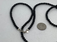 Genuine Black Onyx 4mm stones with sterling silver 29” necklace. SR2041
