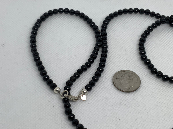 Genuine Black Onyx 4mm stones with sterling silver 29” necklace. SR2041
