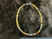 Handcrafted Bumblebee Jasper stone necklace with sterling silver.  17” long, 9 mm, SR1014