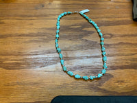 Campitos turquoise in a matte finish with sterling silver fashioned into a 20” necklace.  SR115 FREE SHIPPING IN THE CONTINENTAL USA.