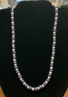 Kingman Turquoise with dyed purple turquoise composite with sterling silver beads. 18”  Z 1022