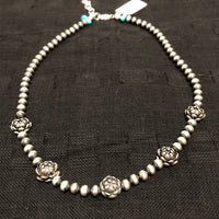 Sterling Silver necklace in oxidized beads and lotus flower beads.  Adjustable length from 15” to 17”. SR147