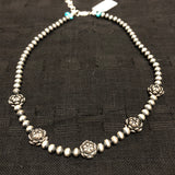 Sterling Silver necklace in oxidized beads and lotus flower beads.  Adjustable length from 15” to 17”. SR147