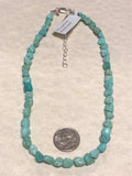 Genuine Campitos mine turquoise with sterling silver in an adjustable 14” to 16” length.  Great as a choker!  SR138 FREE SHIPPING IN THE CONTINENTAL USA.
