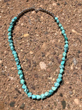 Genuine Campitos Turquoise necklace with sterling silver handcrafted bench beads.  22”.  By A.S.    9