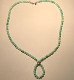 Genuine Turquoise Buddha loop necklace with sterling silver beads and clasp.  21” by A.S.AS 600 FREE SHIPPING IN THE CONTINENTAL USA.