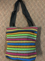 Guatemalan honeycomb weave hand bag with exterior zipper compartment. Approximately 13” x 13”