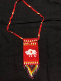 Red glass beadwork in a shoulder bag