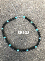 Genuine Black Onyx and turquoise 6mm beads with sterling silver in a 14” to 16” choker length.  SR 132
