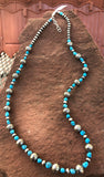 Navajo style pearls with genuine Kingman turquoise in an adjustable length from 23” to 25”. SR116