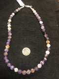 Purple Jasper 8mm round beads in a 17” length with sterling silver. JK25
