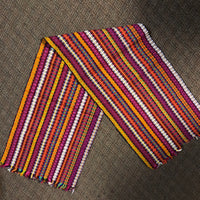 Honeycomb weave colorful table runner.