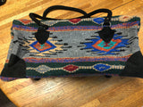Handwoven Recycled Acrylic weekender bag.  18” x 8” wide, 8” tall.