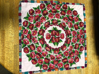 Vintage fabrics put together to form a one of a kind pillow cover.  Round roses