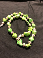 Green turquoise necklace in 17.5” length.  The stones are dyed to resemble natural  Gaspeite.  The stones are alternated  with  Navajo hand soldered sterling silver  beads .   A.S.   GT-1 FREE SHIPPING IN THE CONTINENTAL USA.