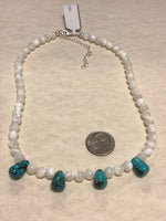 Genuine Turquoise and Mother of Pearl with sterling silver in a 14” to 16” adjustable choker length  SR145