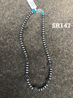 Sterling Silver necklace in oxidized beads and lotus flower beads.  Adjustable length from 15” to 17”. SR147