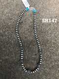 Sterling Silver necklace in oxidized beads and lotus flower beads.  Adjustable length from 15” to 17”. SR147