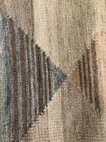 Handwoven beige rug made from recycled water bottles in a contemporary design   #2335-02