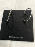 Sterling silver twisted hoop earring with posts.  PS9
