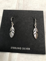 Sterling silver feather earrings. PS19