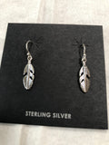 Sterling silver feather earrings. PS19