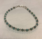 Natural African 4 mm stone beads with sterling silver.  7.5” bracelet SR111 FREE SHIPPING IN THE CONTINENTAL USA.