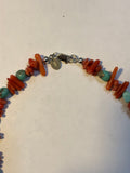 Genuine turquoise with red coral and sterling silver clasp.  18” long by A.S.    AS 603 FREE SHIPPING IN THE CONTINENTAL USA.