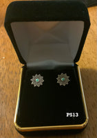 Sterling silver and genuine turquoise post earrings. PS13