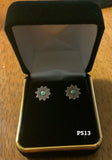 Sterling silver and genuine turquoise post earrings. PS13