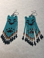 Guatemalan handcrafted glass seed beads earrings in Wolf Head motif.