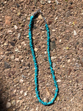 Deep Blue Genuine Campitos Turquoise mini nuggets in an 18” length and sterling  silver beads and clasp. A.S.   CN11