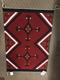 Authentic Navajo Handwoven wool rug by Nellie Dean.  46” x 32”