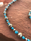 Navajo style pearls with genuine Kingman turquoise in an adjustable length from 23” to 25”. SR116
