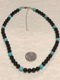 Genuine Black Onyx and turquoise 6mm beads with sterling silver in a 14” to 16” choker length.  SR 132