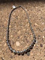 Navajo Pearl inspired seamless sterling silver graduated beads in a 20” necklace, by A.S.    11