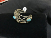 Navajo Handcrafted Sterling Silver and genuine turquoise bracelet by Daniel Mike.
